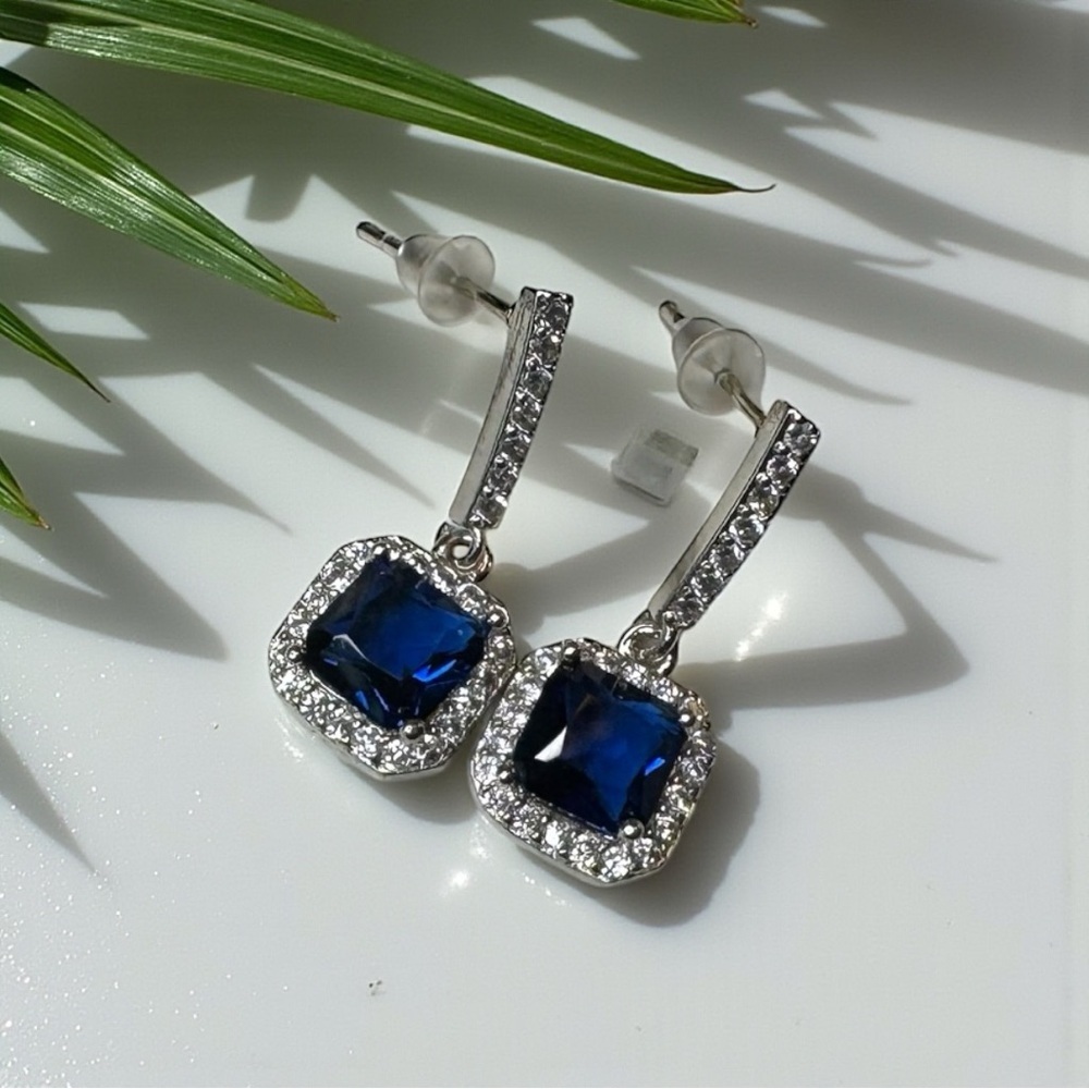 Nikola Valenti Blue Crystal Drop Earrings w/ Halo – Silver Tone